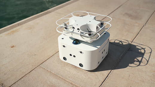 Mesa survey robot on a waterfront promenade
